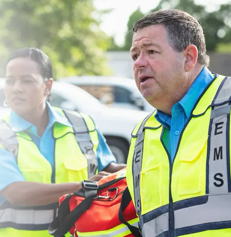 Two EMS responders in action